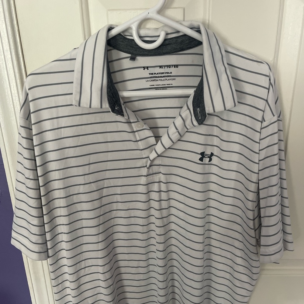 Under Armor. White and black striped polo shirt.